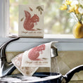 Load image into Gallery viewer, Cream-colored ribbed swedish dishcloth greeting with red squirrel design and enough with the nuts phrase reusable cleaning