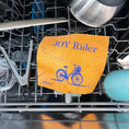 Load image into Gallery viewer, Orange textured joy rider bicycle swedish dishcloth eco gift for cyclists by soak it up with blue graphic text