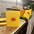 Load image into Gallery viewer, Bright yellow soak it up clards sponge cloth with red pumpkin and are we pumpkin spiceful yet text eco friendly swedish sponge cloths