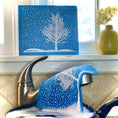Load image into Gallery viewer, Blue snowy tree red cardinal swedish dishcloth made of textured eco-friendly fabric for cleaning tasks