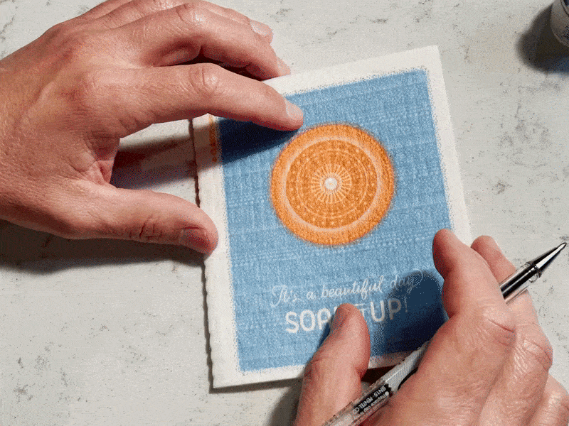 Blue and white reusable swedish dishcloths with sunburst design and its your day soak it up perfect sustainable gift idea