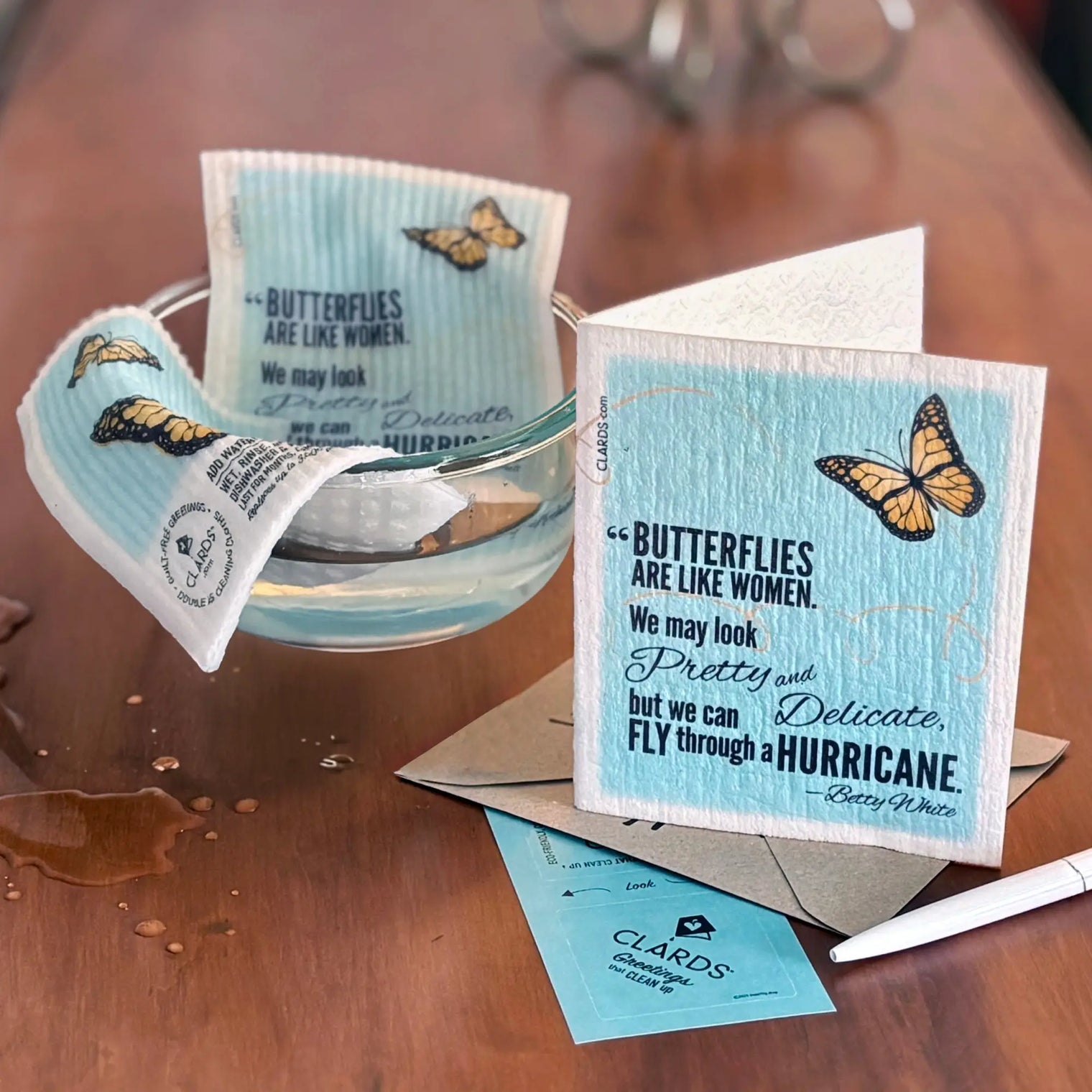 Light blue clards paper towel with monarch butterfly design and inspirational quote helps reduce recycling guilt in greeting cards