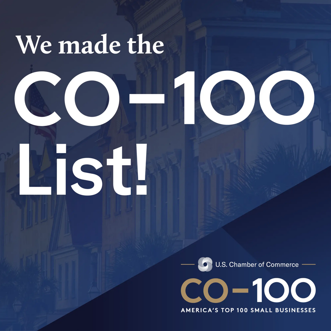 Dark blue graphic with bold white text announcing soak it up made the 2026 co-100 list for small businesses paper towels and greeting card innovation