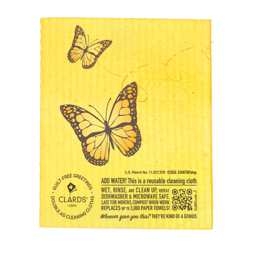 Yellow reusable sponge cloth with black and orange butterfly design perfect for eco cleaning with two reusable swedish sponge cloths