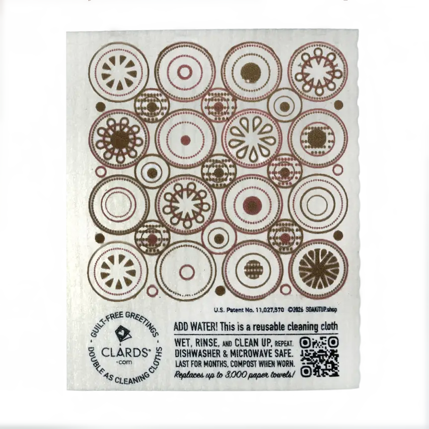 A white reusable cleaning cloth with brown and maroon geometric circles for swedish dishcloth greeting use