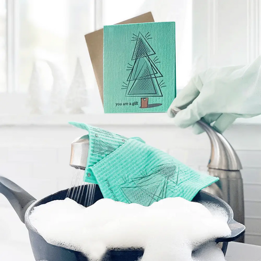 Mint green textured swedish sponge cloth with geometric tree and you are a gift text for reusable cleaning or holiday greeting