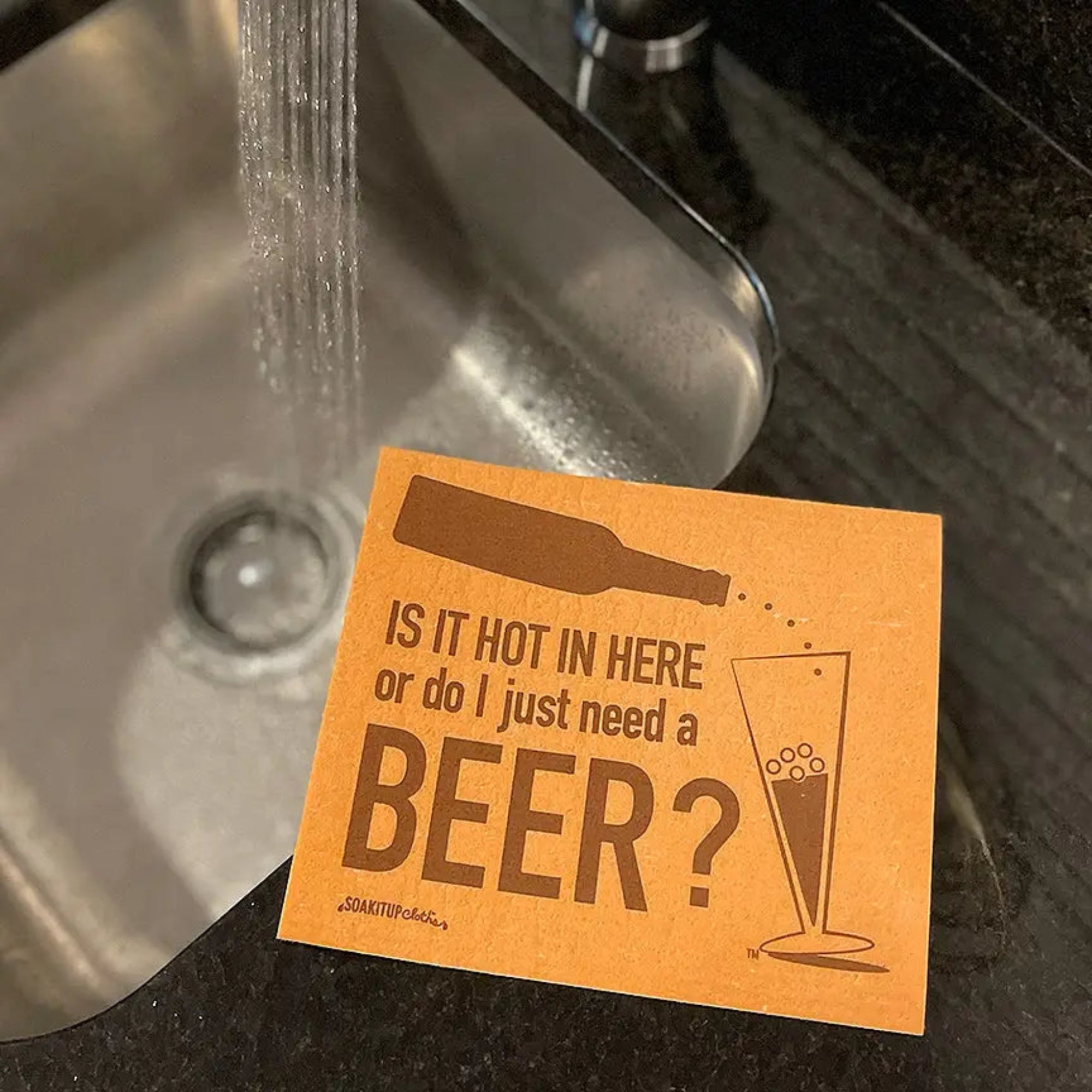 Card with a humorous beer-themed question next to a sink Swedish dishcloth soakitup.shop