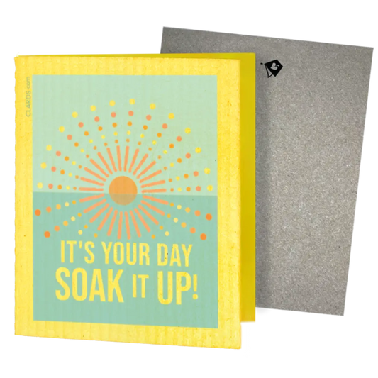 Yellow and teal reusable swedish sponge cloth with sunburst design and guilt free greeting card soak it up text