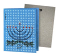 Load image into Gallery viewer, Blue textured hanukkah-themed reusable cleaning cloth with menorah design and love and light label for eco greeting card
