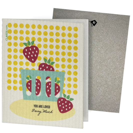 Card with strawberry design and text 'You are loved Berry Much' on a yellow polka dot background, with envelope. Clards eco-friendly greeting card turns into 2 reusable sponge cleaning cloths.