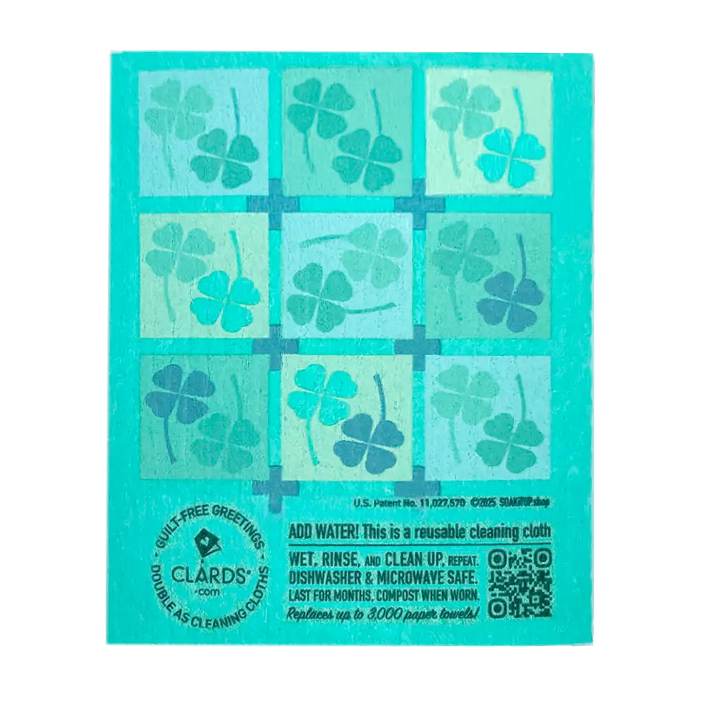 Teal reusable cleaning cloth with four leaf clovers pattern from clards lucky day eco greeting card is microwave safe