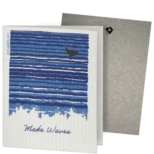 Clards eco-friendly greeting card -  blue wave design and whale illustration, featuring the text 'Make Waves'. - turns into 2 reusable sponge cleaning cloths.