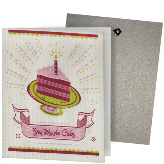 Clards eco-friendly greeting card - cake illustration and text 'You take the cake'  - turns into 2 reusable sponge cleaning on a white background